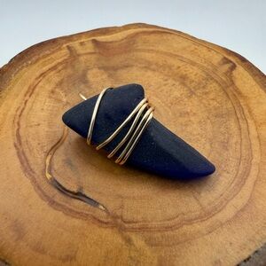 Hand wrapped Navy Blue Tumbled Pendant with Gold Wire Wrap